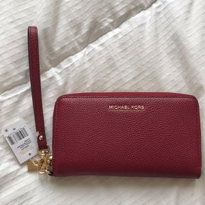 NWT Michael Kors Wristlet / Phone Case in Maroon